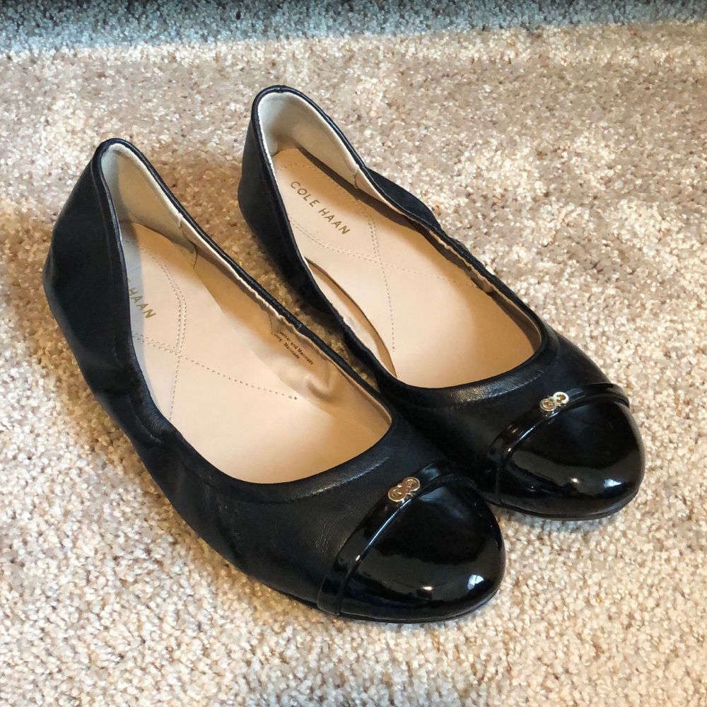 Cole Haan black leather ballet flat.